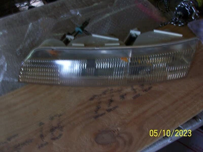 Lincoln Mark VIII 1993 1996 8 faros izquierdo OEM usado reflector desgaste escamas Foto 1 de 4