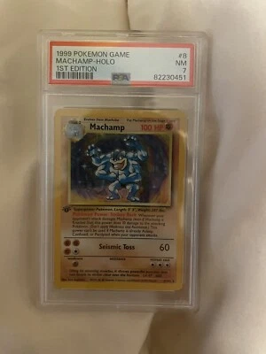 1999 POKEMON GAME 8 MACHAMP-HOLO 1ST EDITION PSA 7 - Image 1 of 2