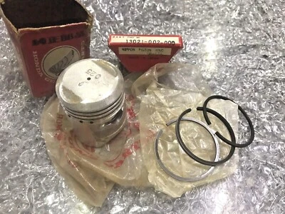 Pistón y anillo Honda Cub 55 C105 C105T CA105T 0,25 NOS 13102-002-000 y 13021-002-000 Foto 1 de 4