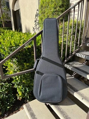 Durable Water-Resistant Acoustic Guitar Case for 39 Inch Guitars - Image 1 of 4