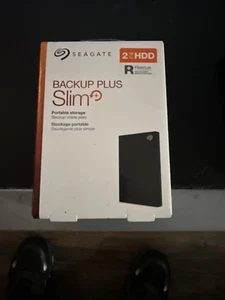 Seagate STHN2000400 Backup Plus Slim USB 3.0 2TB External Hard Drive - Black - Afbeelding 1 van 2