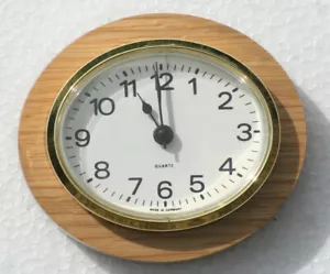 Oval Clock Suitable for Caravans, Motorhomes and Boats. Arabic with brass bezel - Picture 1 of 3
