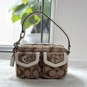 Mini bolso de mano COACH Signature bolsa de accesorios bloqueo giratorio marrón usado 111918 - Imagen 1 de 6