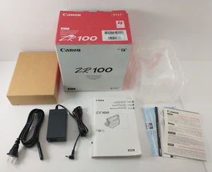 Canon ZR100 Mini DV Camcorder BOX, AC ADAPTER / CHARGER & MANUAL ONLY! - Picture 1 of 8