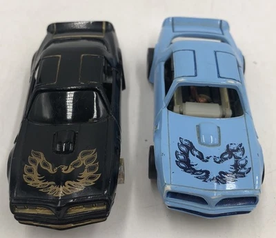 Pontiac Firebird Trans Am Curve Hugger Baby 2 Tyco Slot Car 79 azul y negro dorado Foto 1 de 4