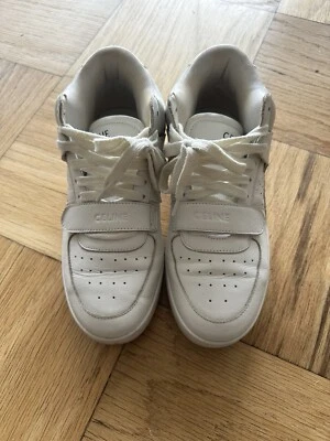 Zapatilla deportiva alta de cuero blanco para mujer Foto 1 de 4