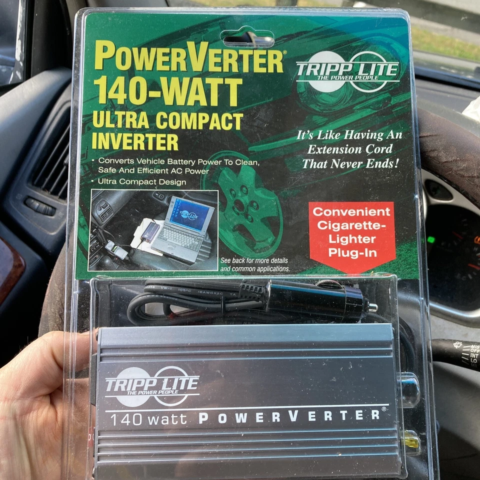 TrippLite 140-Watt 140W PowerVerter,115V AC Outlet, Ultra-Compact Inverter PV140 - Image 1 of 2
