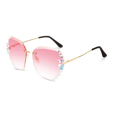 Gafas de sol para mujer de gran tamaño sin montura, lentes de corte diamante con diseño de piedra solar Foto 1 de 4