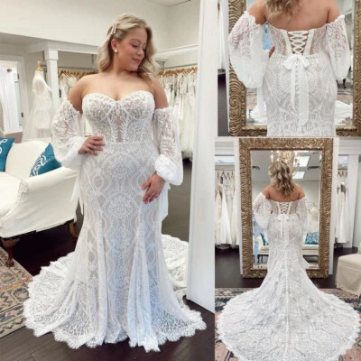 Elegantes vestidos de novia con apliques de encaje talla grande mangas desmontables Foto 1 de 4