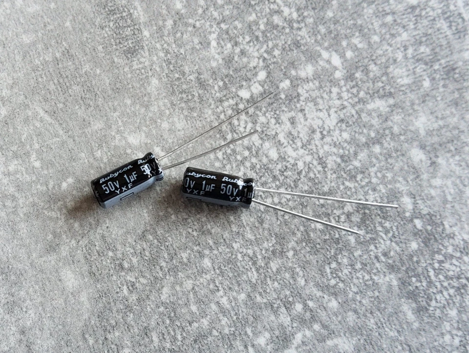 Rubycon 1uF 50V 105°C YXF ELKO Kondensator Radial Menge Wählbar 1-10 Stück - Bild 1 von 1