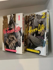 No Guns Life - Manga - Bände 1-2 auf Englisch - 2er Set - Autor Tasuku Karasuma - Bild 1 von 24