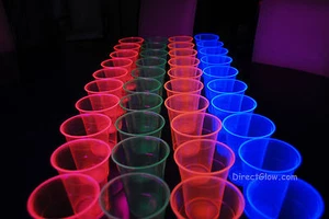 Neon Blacklight Reactive Soft Plastic 16oz Pint Glasses - 40 ct - Picture 1 of 5