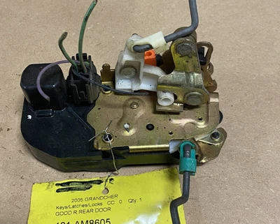Actuador de liberación de pestillo de cerradura de puerta trasera derecha Jeep Grand Cherokee 1999-2004 OEM Foto 1 de 3