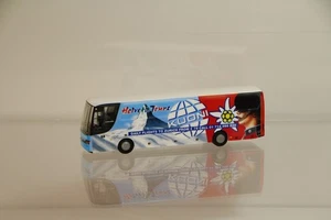 Herpa Kässbohrer Setra S 315 HDH „G&C Tours – Helvetic Tours – Kouni“ /H2906 - Picture 1 of 1