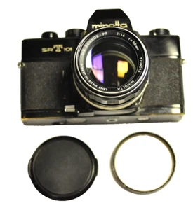 Minolta black SRT 101 35mm SLR w/a 50mm f1.4 lens, filter, battery & front cap. - Picture 1 of 9