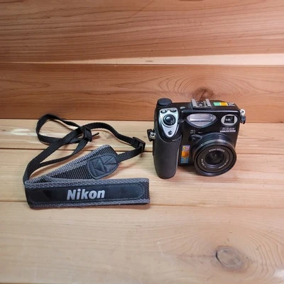 Nikon Coolpix Digital Camera 5MP Tested Working Nikon E5000 W/ Strap And Battery - Image 1 of 4