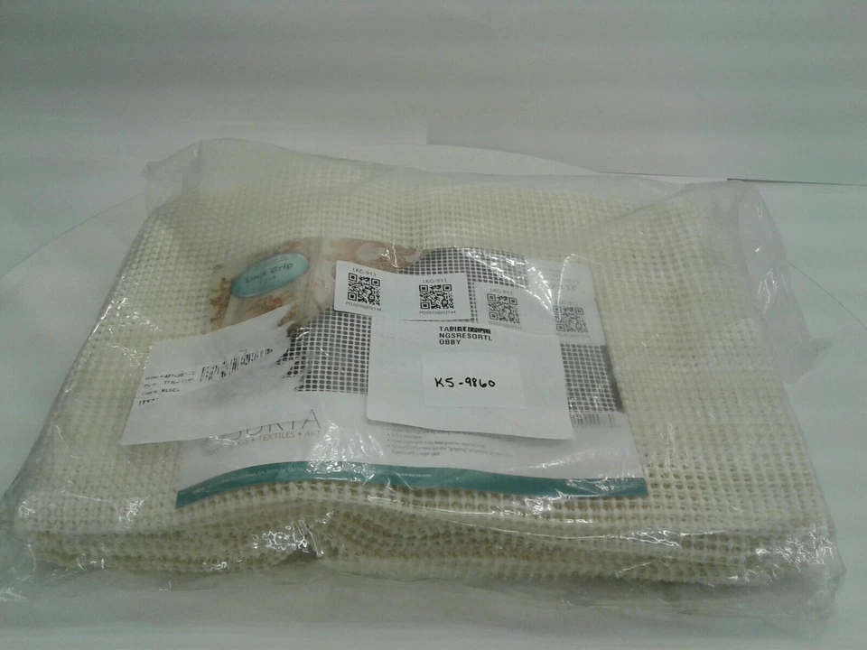 Almohadilla de alfombra con agarre de bloqueo Surya LKG-913 9' x 13' Foto 1 de 3