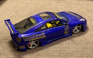 Jada Import Racer Toyota Celica DieCast Car 1:24 Blue/Yellow - Picture 1 of 7