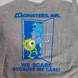 Disney Pixar Monsters, Inc Gr. XL grau Baumwollmischung Kurzarm We Scare Care - Bild 1 von 6