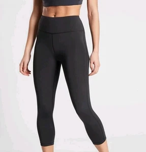 Leggings ajustados capri ATHLETA Ultimate Stash Pocket negros medianos nuevos con etiquetas ropa deportiva - Imagen 1 de 4