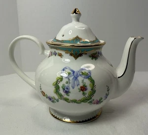 Tetera de porcelana de hueso fino castillo de la reina Isabel Windsor: gran exposición Inglaterra - Imagen 1 de 12