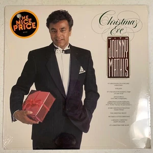 Christmas Eve with Johnny Mathis - SEALED LP VINYL- JACKET HAS DRILL HOLE - 1986 - Picture 1 of 1