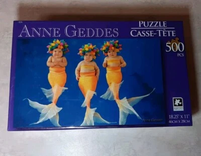 NIB Karmin Anne Geddes Babies as Coy Fish 500 Piece 18.25" x 11" jigsaw puzzle - Image 1 of 4