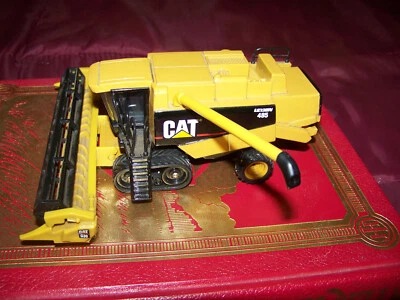 Cat Lexion 485 tracked combine w/ bean header, 1/64, Ertl, Nice, displayed - Image 1 of 2