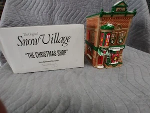 Department 56 Snow Village, The Christmas Shop # 5097-0 With Light RETIRED - Picture 1 of 2