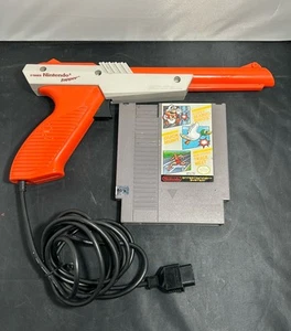 Nintendo NES Zapper Orange w Super Mario, Duck Hunt, Track & Field TESTED - Picture 1 of 5