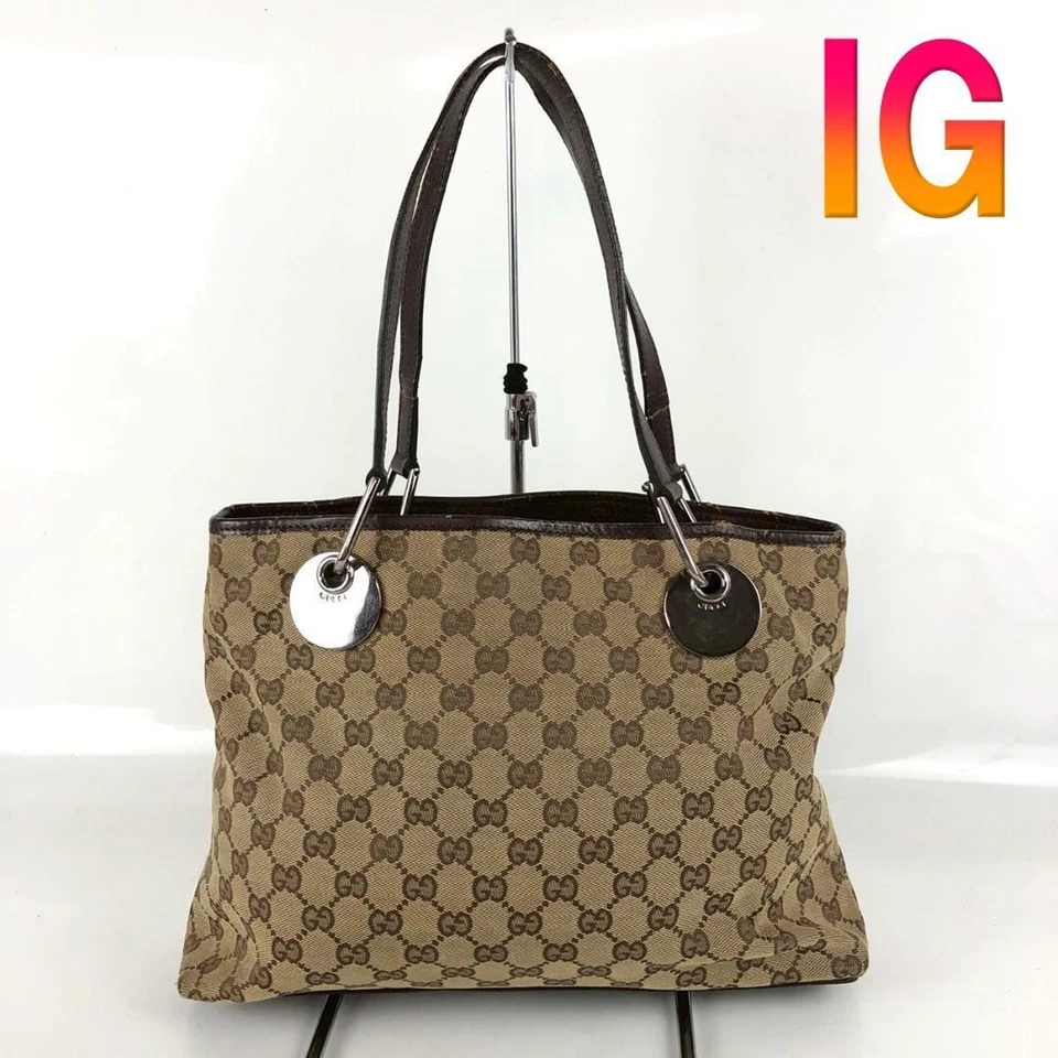 Vintage Gucci Tote Shoulder Hand Bag Beige Leather GG Purse Authentic Silver - Image 1 of 4