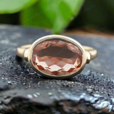Anillo solitario de oro macizo de 9k de 14x10 mm con forma ovalada de morganita natural Foto 1 de 4