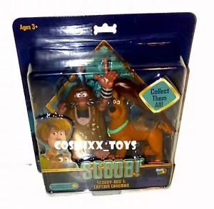 SCOOB! PACK DE 2 FIGURAS DE ACCIÓN SCOOBY-DOO & CAPTAIN CAVEMAN WARNER BROTHERS - Imagen 1 de 2