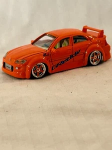 Motorworks 1:64 Scale GReddy Tuner Car, 2002 Lexus IS 300, Orange Variation - Picture 1 of 13