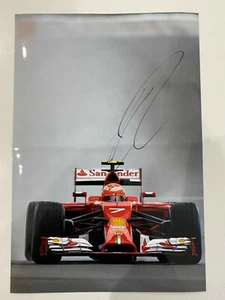 Kimi Raikkonen signed Ferrari F1 A4 photo - Picture 1 of 2