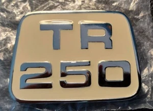 Triumph TR250 (TR5) Cream Enamel & Chrome Bonnet Hood Badge / Medallion, 622278 - Picture 1 of 6