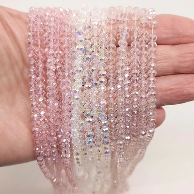 Chinese Crystal 3mm, 4mm Faceted Rondelle Beads with AB Finish, Light/Pale Pink - Image 1 of 3
