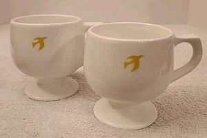 Vintage Pair Of Northeast Airlines Footed Coffee Cups Yellow Bird Emblem Rare 🔥 - Picture 1 of 6
