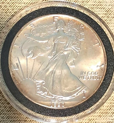 1990 1 oz Silver American Eagle (Brilliant Uncirculated W Light Toning)   - Image 1 of 4