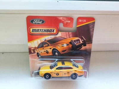 Matchbox Ford Police Interceptor gelb NYC Taxi Checker Cab OVP Neu - Bild 1 von 2