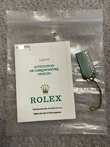 1991 Rolex Submariner 16610 E Series Guarantee Paper and matching Swimpruf Tag