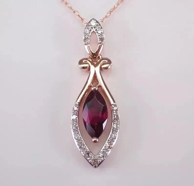 Colgante lágrima rubí rojo creado en laboratorio corte marquesa de 1,80 quilates enchapado en oro rosa de 14 quilates Foto 1 de 4