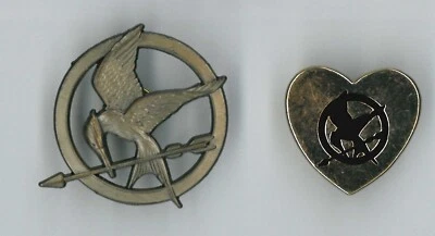 2 Hunger Games movie pins - Mockingjay - collector badge - Image 1 of 2