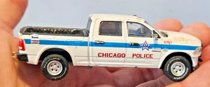 Greenlight 2016 Chicago Police Ram 2500 lose Druckguss-LKW auf Kriminelle gestoßen - Bild 1 von 6