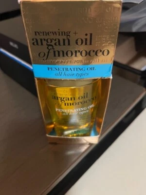 Обновляющее и марокканское аргановое проникающее масло OGX 3,3 жидк. oz. - Изображение 1 из 4