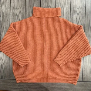 Free People Swim Too Deep Turtleneck Pullover Sweater in Goldrust Terracotta - Picture 1 of 9