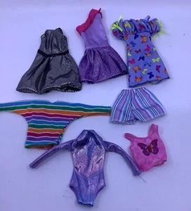 Konvolut 7 Modepuppenkleidung passend für Barbie Puppen - Bild 1 von 7