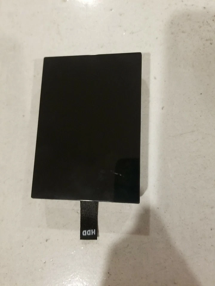 Disco duro interno HD de 20 GB Slim oficial Xbox 360 OEM  Foto 1 de 3