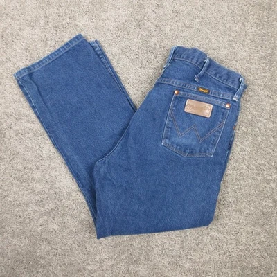 Pantalones de mezclilla regulares corte vaquero Wrangler Jeans para hombre 36x27 (etiqueta 36x30) azul 13MWZ Foto 1 de 4