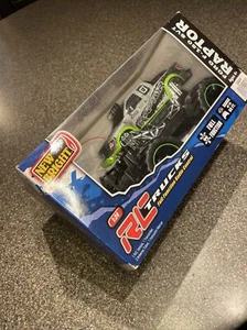 New Bright R/C Raptor Ford F-150 SVT 1:24 Truck Radio Control Silver/Green SU - Picture 1 of 6